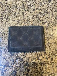 Men’s Black Signature Gucci Logo Bi-Fold Wallet. 100% authentic. Bought from Gucci about 10 years ago. Hasn’t been...