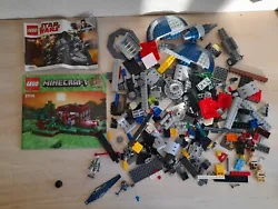 LOT LEGO STAR WARS. Un lot en vrac avec divers pièces pour le vaisseau et personnages + 2 notices. Non vérifié (...