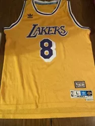 This Listing is for a Kobe Bryant #8 Lakers Yellow Jersey Size Large L Hardwood Classics. This jersey is pre-owned in...