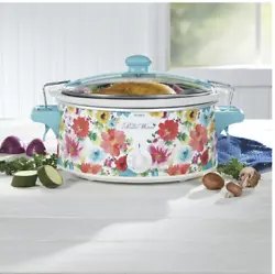 The stylish Pioneer Woman® Breezy Blossom 6 Quart Portable Slow Cooker is ideal for cooking and carrying food to...