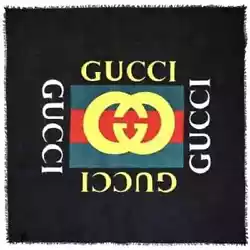 This beautiful black shawl from Gucci is woven with a soft silk blend. This versatile piece that can be worn multiple...
