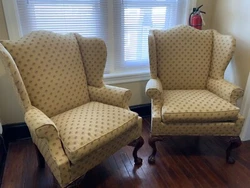 Antique-style, Queen Anne Chair. Ladies scale wing chair with carved pad feet on the front legs, square curved legs on...