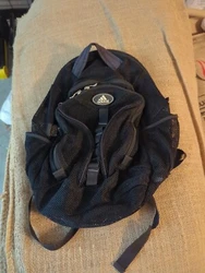 This black Adidas backpack is the perfect accessory for any style-conscious man. The mesh material offers durability...