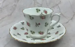 The teacup and saucer are decorated with delicate Rosebuds and Gold trim around the edges. Antique EB & C Foley Teacup...