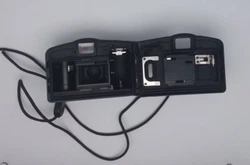 While its functionality is untested, it holds the potential for unique photographic experiences. Model: Sure Shot Owl...