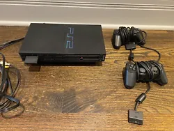 Sony PlayStation 2 Console - Black (SCPH-39001) with 2 Controllers (used). Comes with necessary cords. 