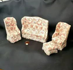 Two wingback chairs and a matching ottoman. High Back Sofa with a pleated skirt. Beautiful cream colored floral fabric...