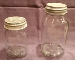 There are very pronounced embossed lettering and star designs on both jars. you may have regarding.