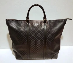 GUCCI STYLE #308896. 100% AUTHENTIC GUCCI DIAMANTE CANVAS TOTE WITH LEATHER TRIM LARGE ZIP TOP IN DARK BROWN/BRONZE....