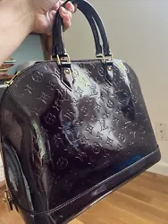 Authentic Louis Vuitton bag, bought a couple of years ago. Worn only a couple of times. There are some minor scuffs on...