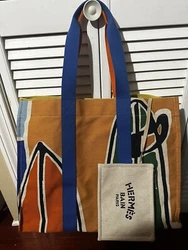 Estimated Retail Price: $1,900 Condition: Excellent. Minor creasing on exterior, light wear on base corners....
