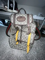 GUCCI Backpack GG Supreme bag871. Purchased last year only used on the 3 trips I have been on. My cat actually chewed...