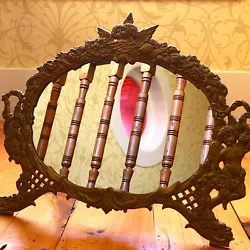 The mirror has a few small flecks. Great detail and relief. The mirror is 12 1/4” across and 8 1/4” high. Weighs...