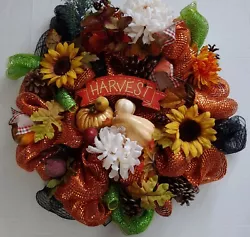 With sunflowers, asst flowers, pine cones, gourds, fall leaves, etc. Assorted flowers, sunflowers, pine cones, gourds,...