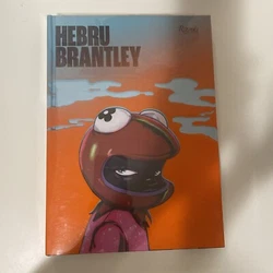 Book is signed by the artist on a book plate. Minor shelf wear to book.