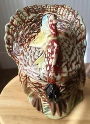 A wonderful depiction of a strutting turkey makes this cookie jar stand out on the counter.  McCoy produced this item...