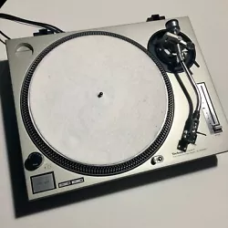 The turntable doesnt have a cover and requires a new needle.
