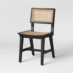 •Black wooden dining chair with rattan open-weave lattice design for timeless flair •High back and curved seat keep...