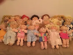 Lot of 21 Vintage Cabbage Patch Dolls. Some are in better condition than others. Only some have original clothing. Sold...