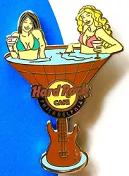 Pin features, Two Sexy Blonde & Brunette Bikini Clad Girls sitting in a Martini Guitar Shaped Hot Tub sipping Martinis....