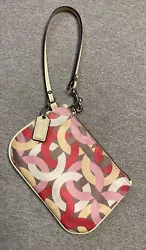 COACH multicolor satin wristlet In used but good condition