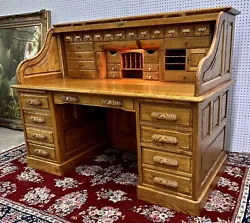 In person, this desk is a strong example of beautiful form and function. All drawers open smoothly, and all writing...