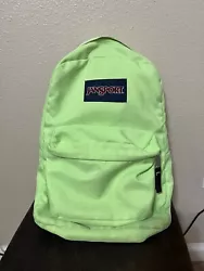 Bright Mint Green Jansport Backpack Travel Luggage School. The bookbag does have some wear and tear and stains but all...