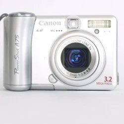 Canon PowerShot A75 3.2MP Digital Camera - Silver. Camera works, but only displays purple screen/lines shown in photos....