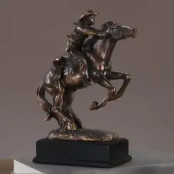 This is a great Western Cowboy riding a rearing horse. These sculptures are made using a bronze electro-plating...