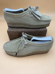 In good used condition. Very minimal wear. There is small marking on one side of one shoe.