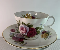 Rosina Fine Bone China Tea Cup and Saucer Roses made in England. Beautiful Set scalloped edges. No Chips Cracks or...