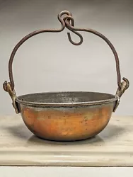 This vintage copper cauldron pot is a must-have for collectors of metalware. Its unique patina and large size make it a...