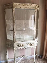 Beautiful antique armoire with glass doors and key opening. Perfect for displaying figurines or collectibles