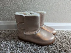 UGG Toddler Pink Shimmer Australian Boots/booties Size 7.  Box and tags are not included. Never worn