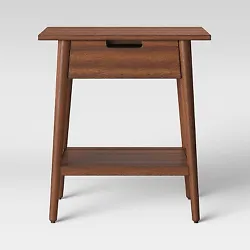 •Brown wooden accent table includes a single drawer and an open shelf for storage and display •Geometrical...
