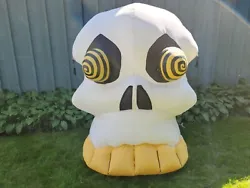 This rare Gemmy Airblown inflatable skull with spinning eyes inflates very well, there are three holes in the back...
