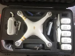 DJI Phantom 3 Professional Drone with 4K Camera- White With 2 Carrying Cases￼,. It comes with extra parts