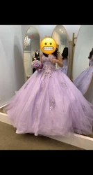 quinceanera dress medium size lavender color only tried on once. Condition is 