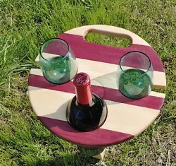 One of a kind folding wine table ! Holds 2 wine glasses and one bottle. Made of 3/4