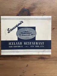 This is a souvenir photograph folder from the Iceland Restaurant in New York. It contains a photograph of a group of...