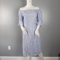 Nanette Lepore Spring Bloom off the shoulder midi sheath dress in Iris Bliss purple lace with flared sleeves. Length...