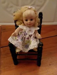 Small Porcelain Figurine In Chair.[MB9] Couldnt find any markings on figure or chair , seems older and well made tho ,...