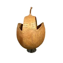 Add a tropical touch to your home or garden with this unique Coconut Shell Basket Hanging basket. Made from natural...