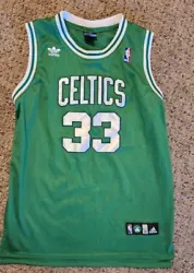 You are looking at a ADIDAS BOSTON CELTICS LARRY BIRD #33 JERSEY SIZE 52. It is in really good used condition.
