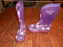 Bogs girls boots. Flower Dots. These boots are in very good condition. Minimal signs of wear on boots, mostly on the...
