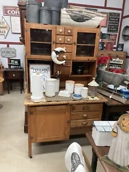 Antique Hoosier Cabinet. Very nice one with flower bin. In excellent condition. Made out of oak. Available for local...