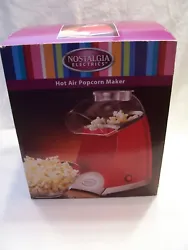 This is a brand new popcorn machine, nestalgic Electronicsr  red hot air popcorn maker.