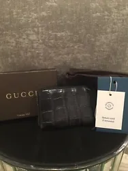 ESTATE FIND,,,FOR YOUR CONSIDERATION IS A VINTAGE GUCCI CROCODILE ZIPPER WALLET,,,,MINT UNUSED CONDITION,,,,EBAY SEALED...