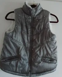 This item is described as best as I see it. I will always try toget back ASAP. THIS IS A BESUTIFUL GIRLS PRE-OWNED VEST...