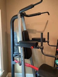Used by a woman , pull up station and dip station